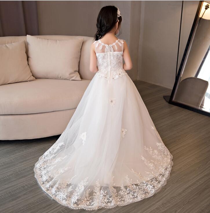 long sequin white dress Long Sequin Prom Dress with Feathered Side Slit